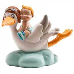 Tortenfigur kleiner Junge fliegender Storch auf einer Wolke